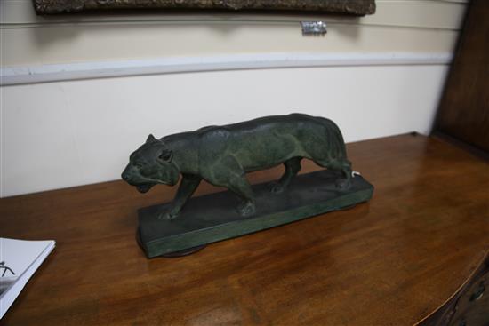 A French Art Deco painted terracotta figure of a panther, 24in.